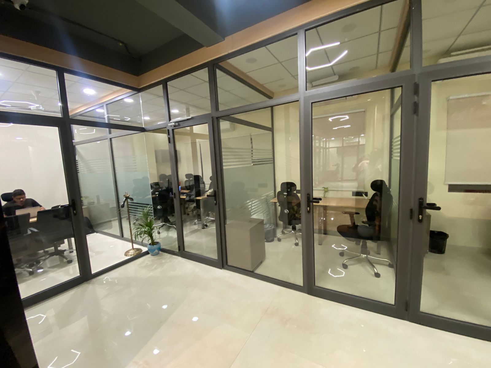 Glass-walled private office pods